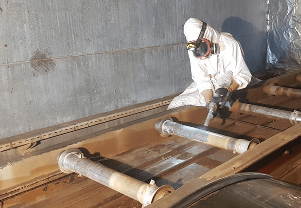 Torch and wrist assembly with spatter removed around cables